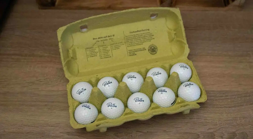 golf ball in a tray