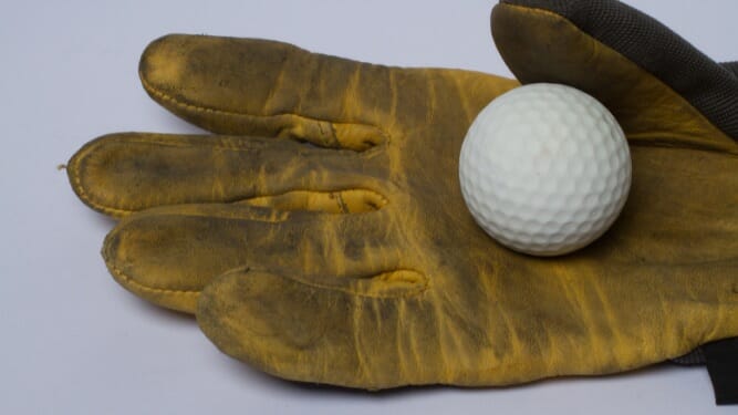 golf balls in a golf glove