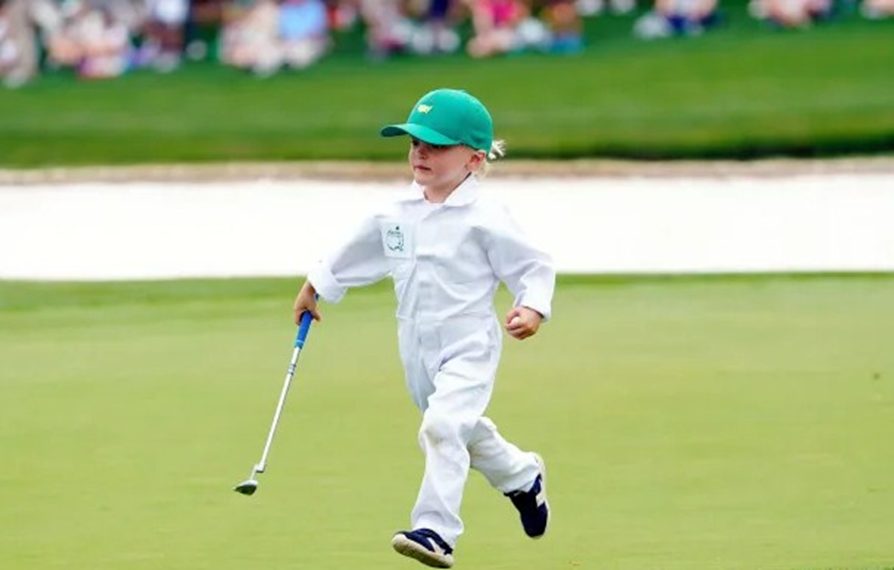 a child playing golf