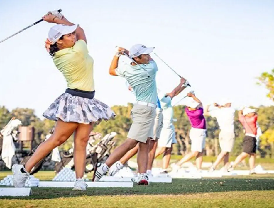 men and women playing golf tournament