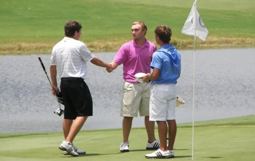 three guys in the golf course