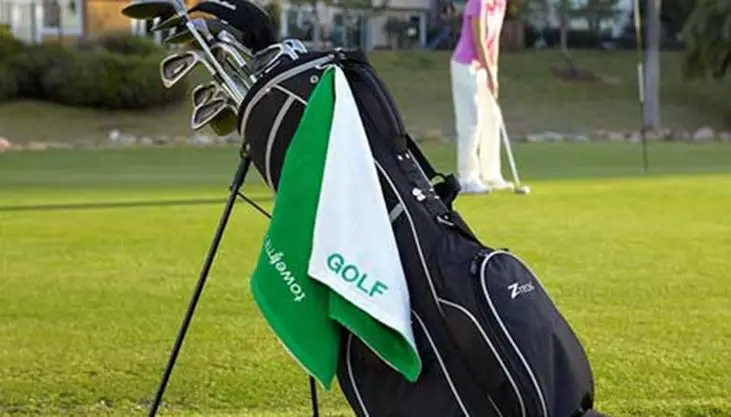 how-to-hang-golf-towel-with-hole-in-middle-guide