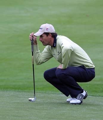 Golfer using an appropriately sized golf club